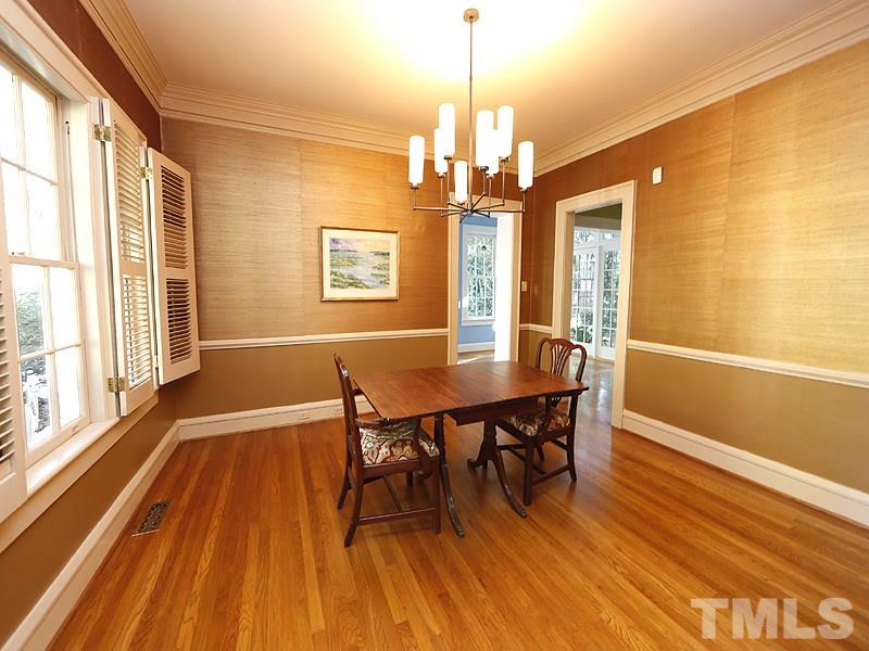 1804 St Marys Street Raleigh, NC 27608 - Photo 7 of 25 a view of a dining room with furniture window and wooden floor