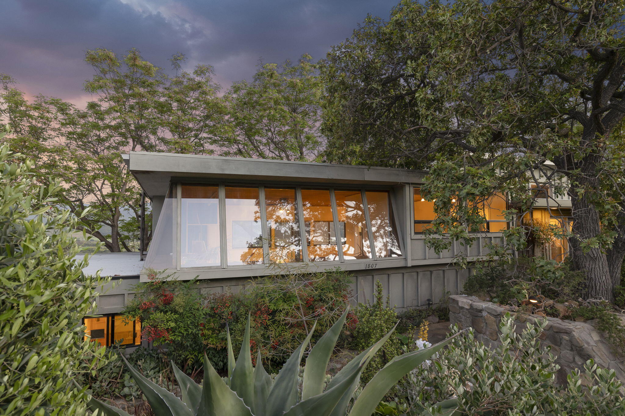 a view of a backyard of the house