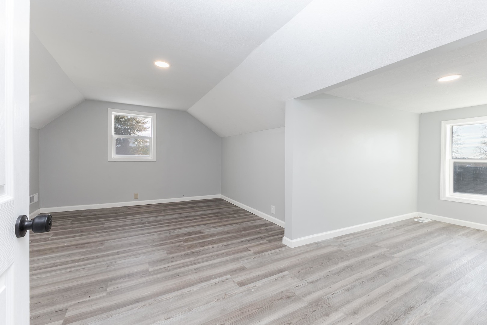 401 6th Street Cornell, IL 61319 - Photo 22 of 33 wooden floor in an empty room with a window