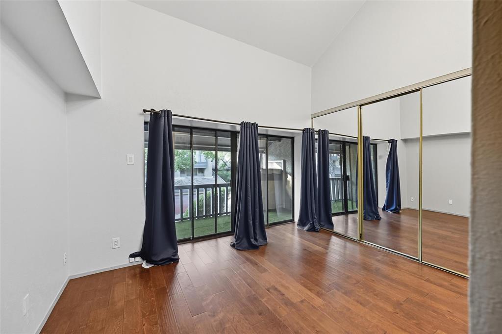 4521 North O'Connor Road, Unit 2169 Irving, TX 75062 - Photo 6 of 17 an entryway with wooden floor and windows