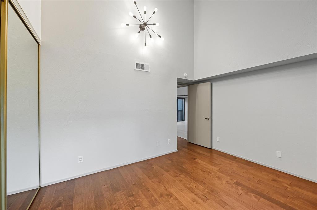 4521 North O'Connor Road, Unit 2169 Irving, TX 75062 - Photo 7 of 17 a view of empty room with wooden floor