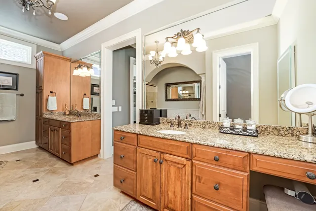 a utility room with sink dryer and washer