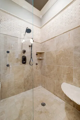 a bathroom with a granite countertop sink mirror and vanity