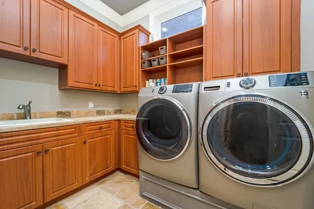 a bedroom with a bed and a flat tv screen