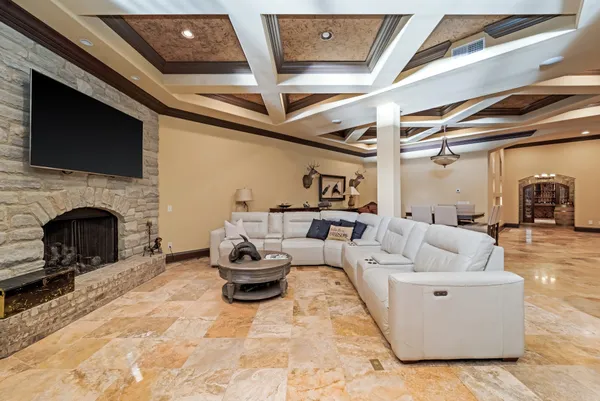 a bedroom with a bed and a ceiling fan