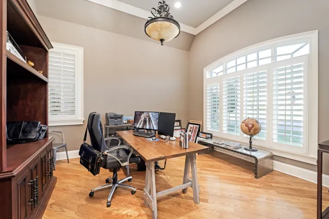 a large kitchen with stainless steel appliances granite countertop a stove oven and a sink