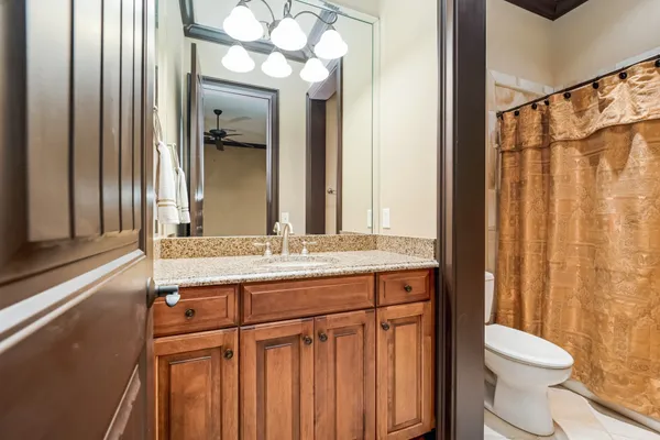 a bed room with a bed and a window