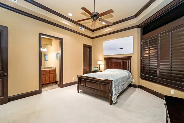 a view of a chairs and table in a room
