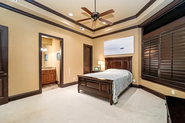 a view of a chairs and table in a room