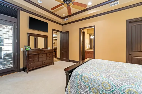 a room with lots of furniture and lots of wooden furniture