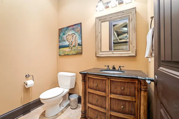 a view of a patio with a dining table and chairs