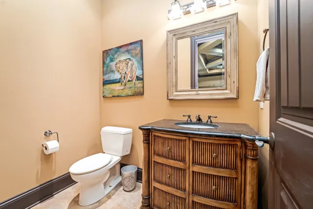 a view of a patio with a dining table and chairs