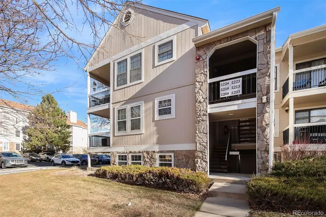 a front view of a building with balcony