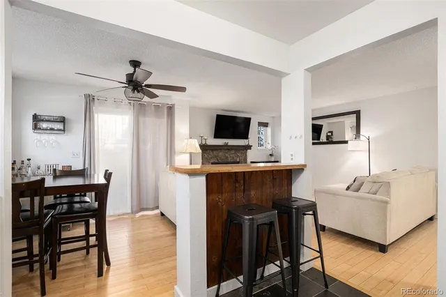 a view of a livingroom with furniture and a flat screen tv