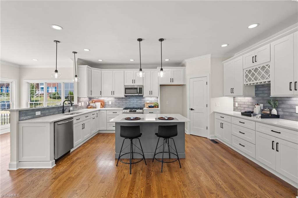 8419 Pheasant Ridge Drive Colfax, NC 27235 - Photo 15 of 49 This kitchen is a chef's Dream!