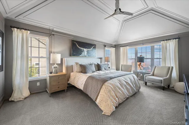 a bed room with a bed and a couch