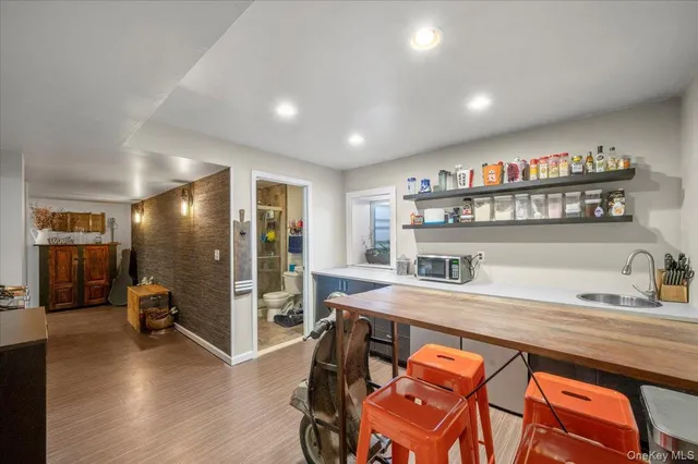 a workspace with furniture and wooden floor