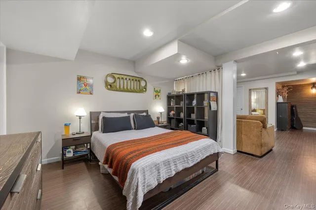 a bedroom with a bed and walk in closet