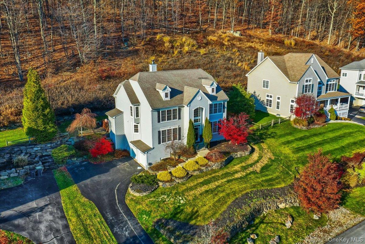 11 Heather Ridge Highland Mills, NY 10930 - Photo 4 of 38 an aerial view of a house with a yard and lake view