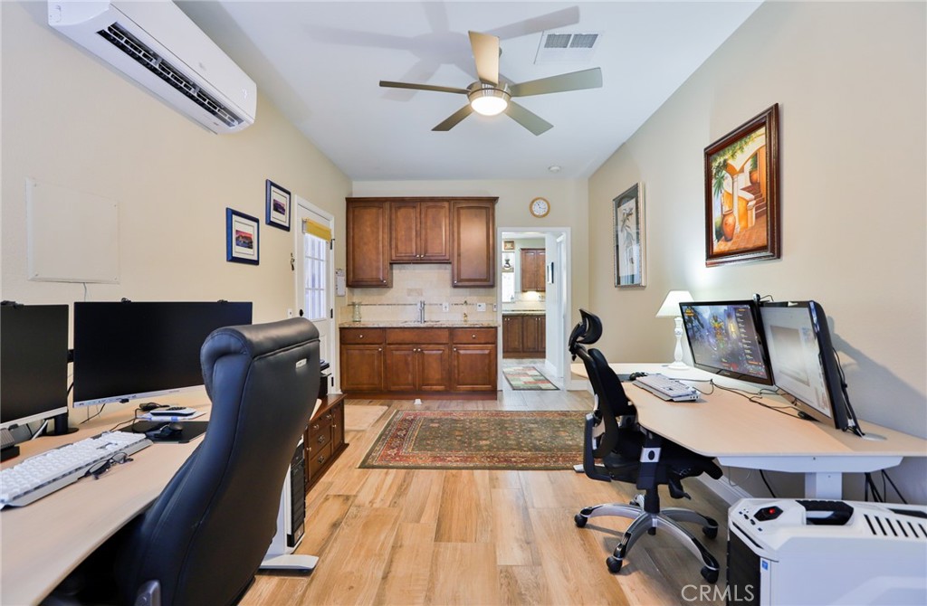 1789 Kapalua Bay Lane Corona, CA 92883 - Photo 26 of 63 a view of a workspace with furniture and a workspace