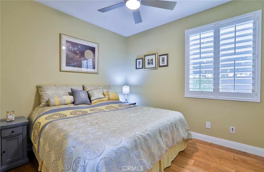 1789 Kapalua Bay Lane Corona, CA 92883 - Photo 38 of 63 a bedroom with bed and a window