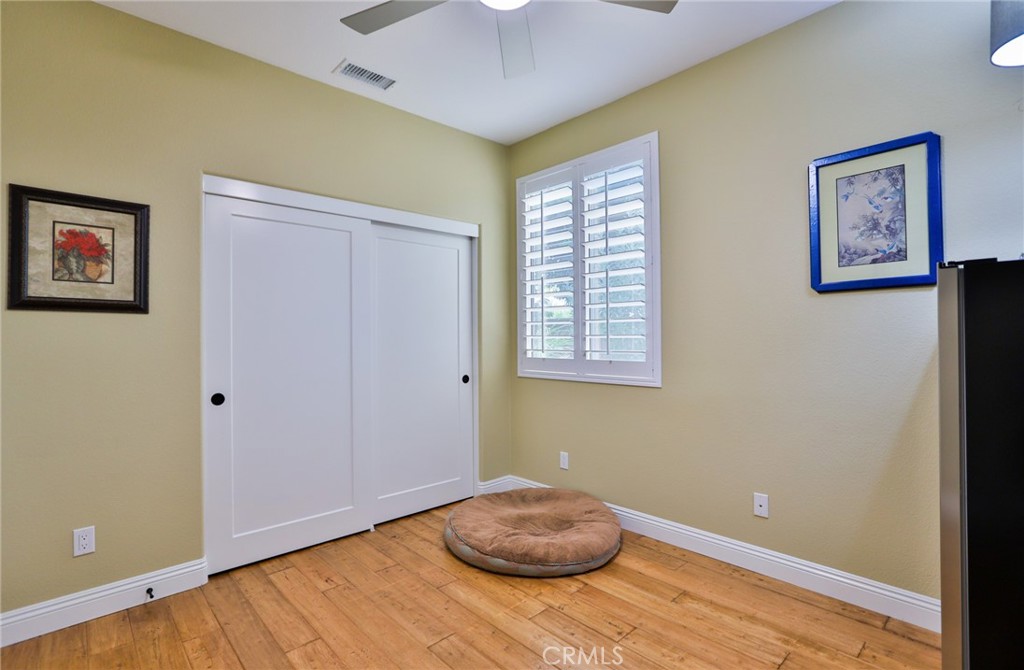 1789 Kapalua Bay Lane Corona, CA 92883 - Photo 44 of 63 a view of a livingroom with wooden floor and window