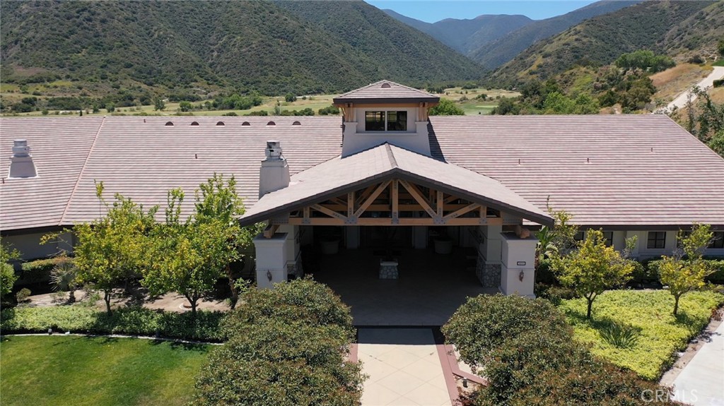 1789 Kapalua Bay Lane Corona, CA 92883 - Photo 62 of 63 an front view of a house with a garden