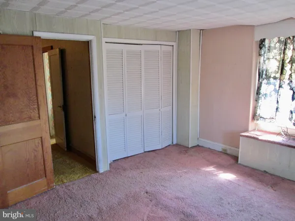 a view of a room with an empty space