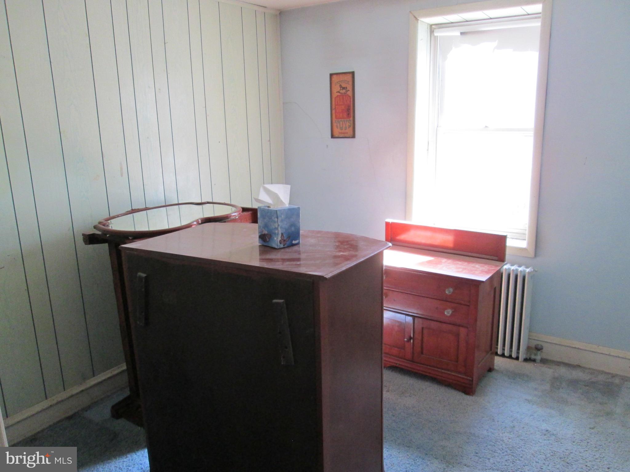 431 Raymond Street Reading, PA 19605 - Photo 22 of 50 a room with a sink and a mirror