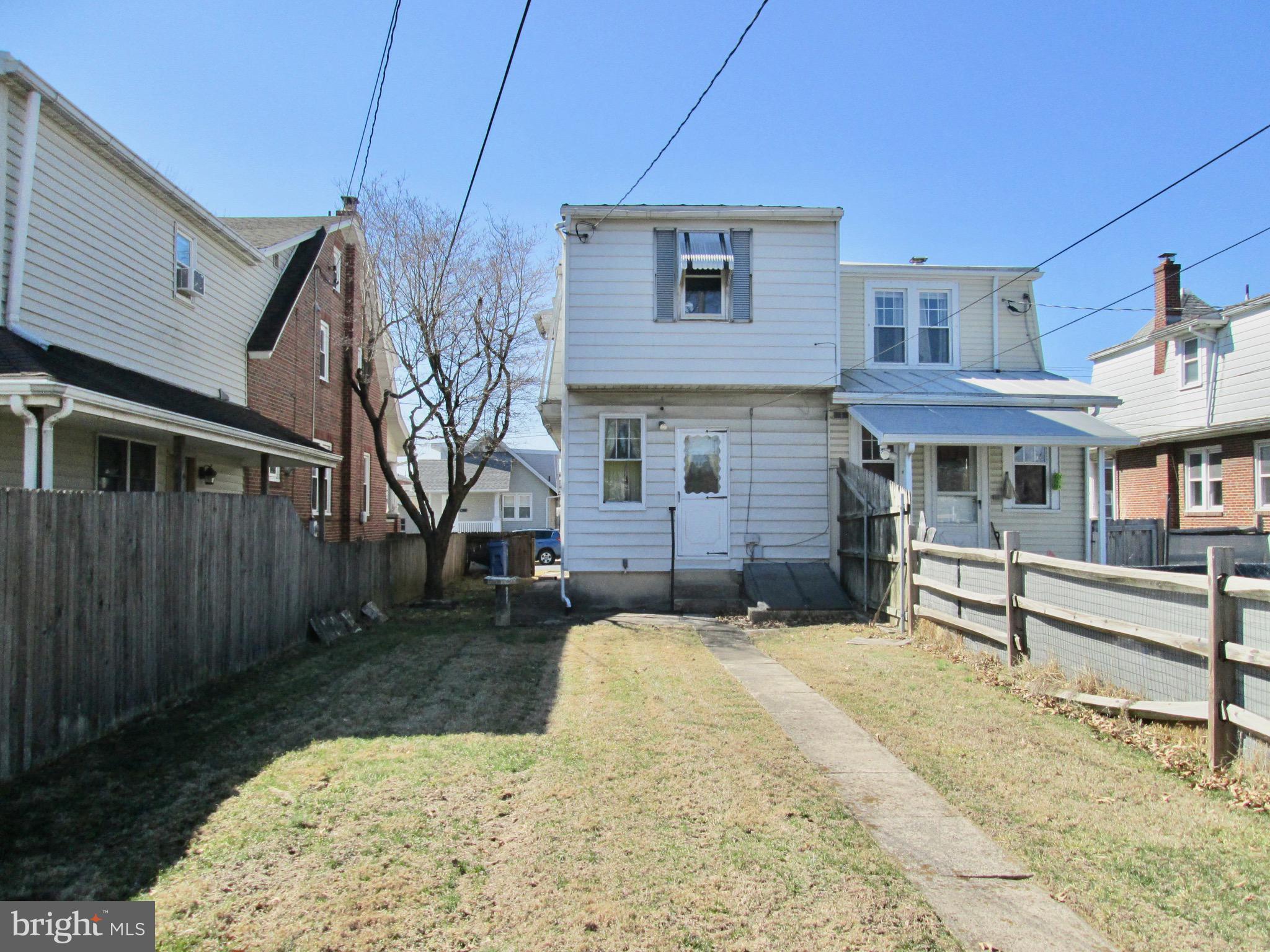 431 Raymond Street Reading, PA 19605 - Photo 41 of 50 a view of a house with a yard