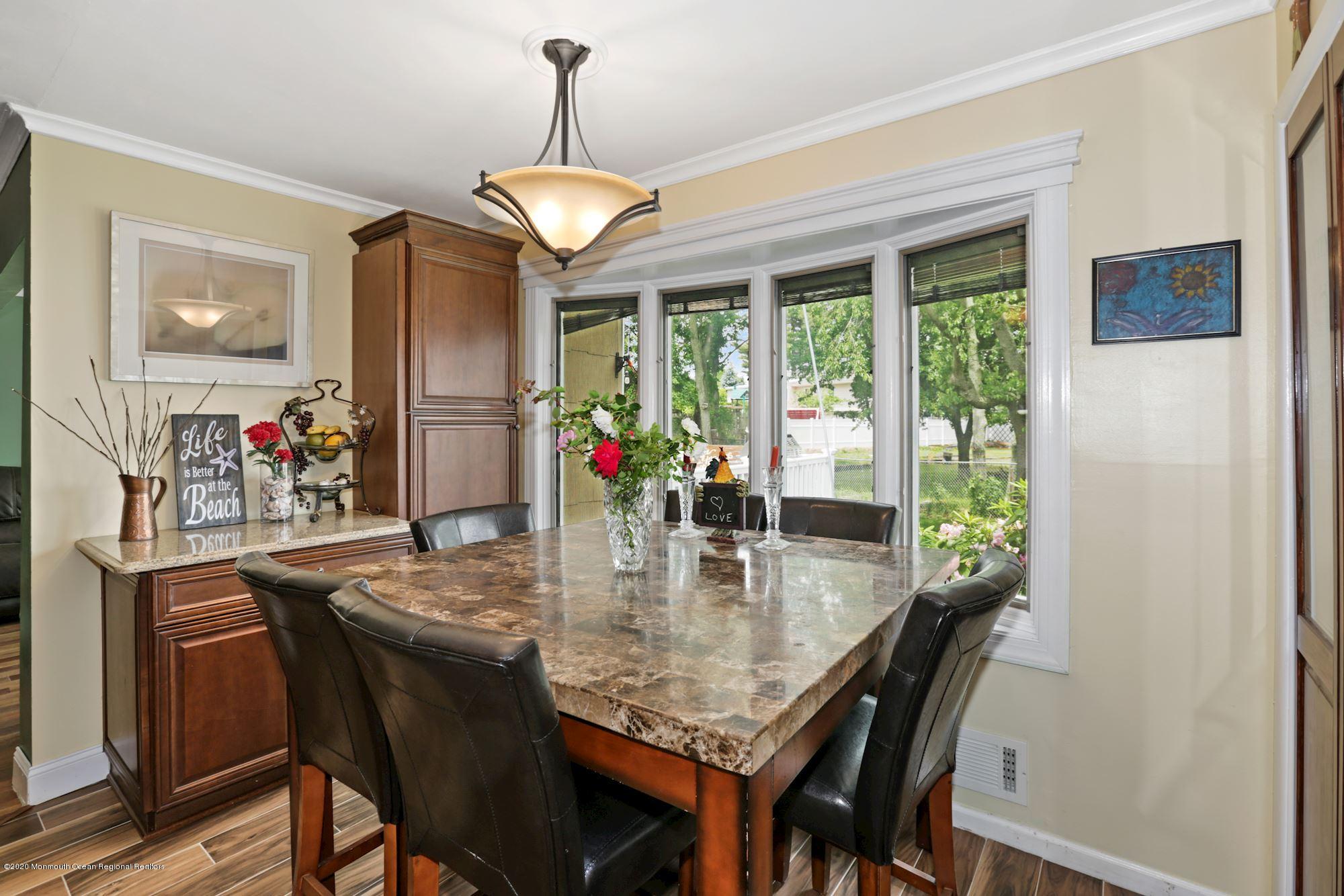 429 Crestview Terrace Brick, NJ 08723 - Photo 13 of 29 a view of a dining room with furniture window and outside view
