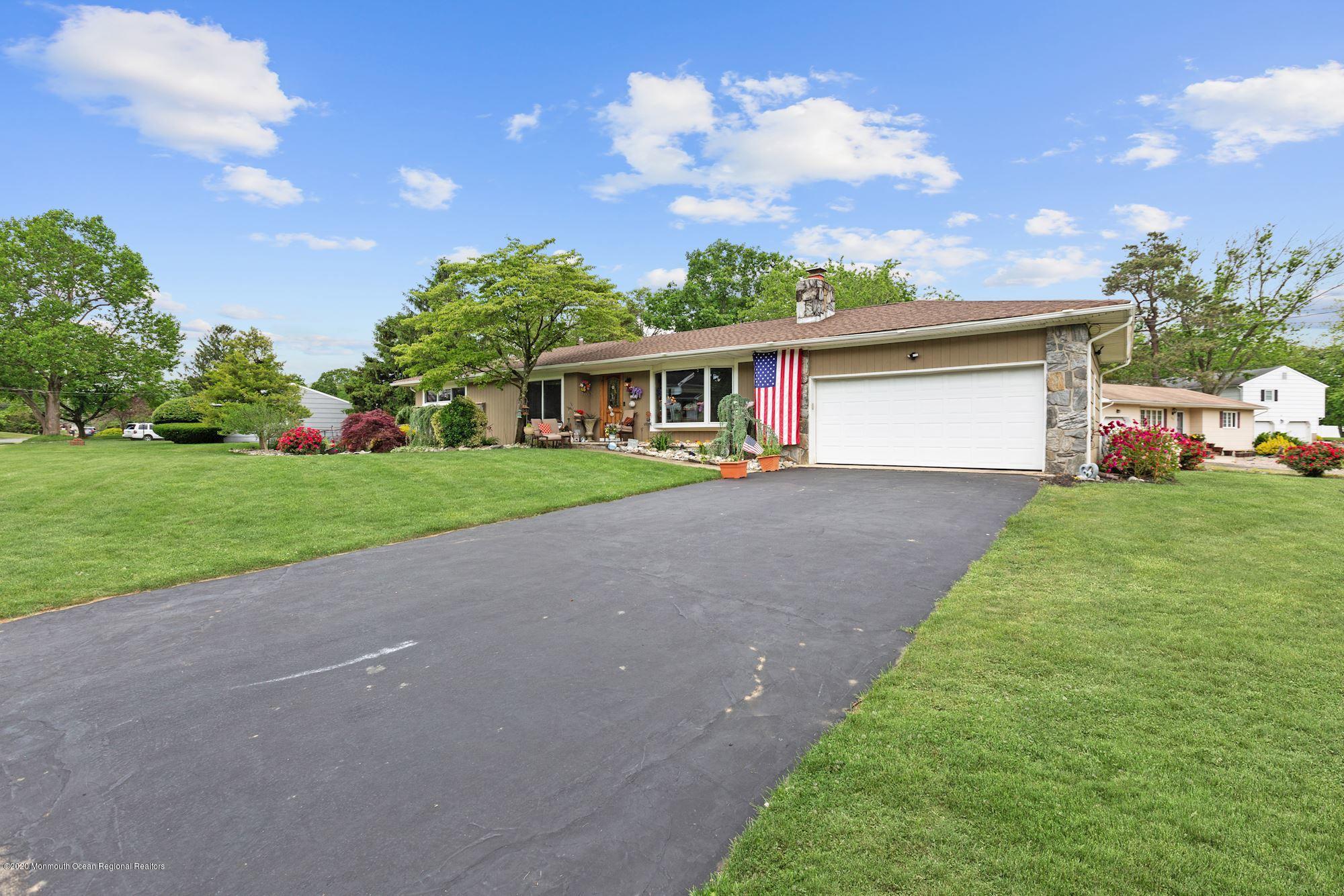 429 Crestview Terrace Brick, NJ 08723 - Photo 3 of 29 a view of a house with a yard and garage