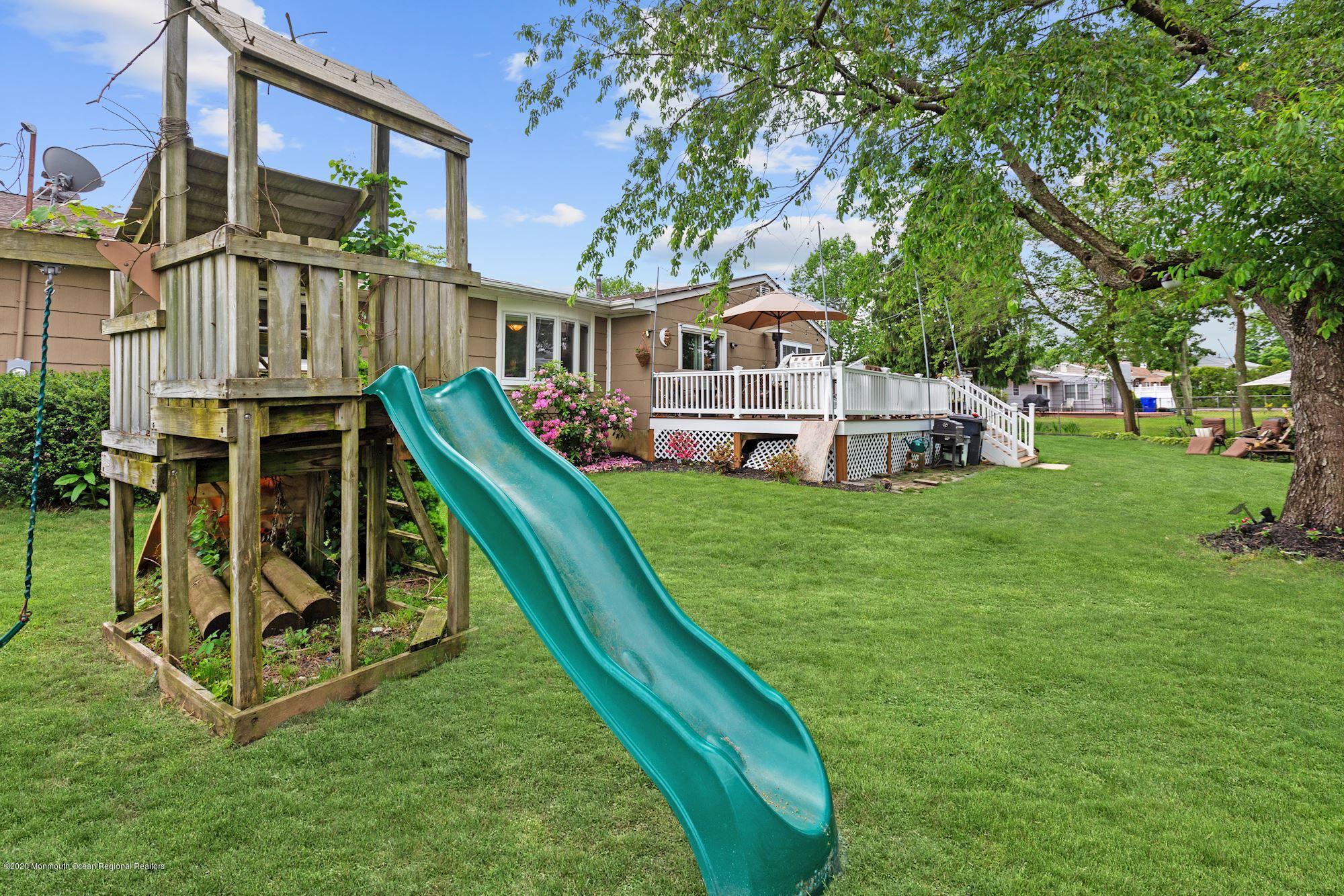 429 Crestview Terrace Brick, NJ 08723 - Photo 6 of 29 a view of a house with a yard