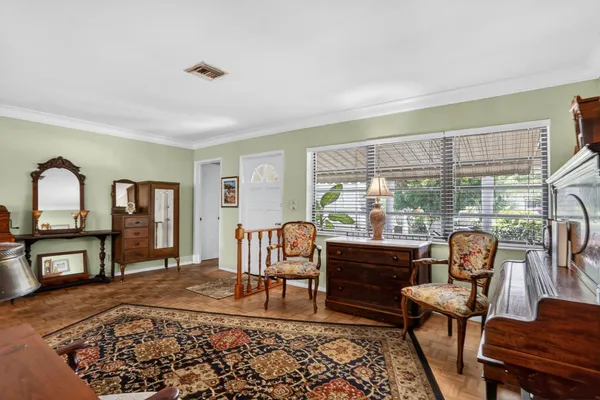 a living room with furniture and a window