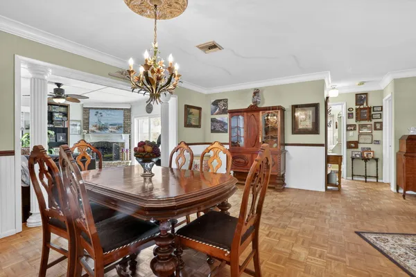 a view of a dining room with furniture