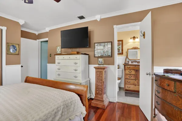 a bedroom with a bed and furniture