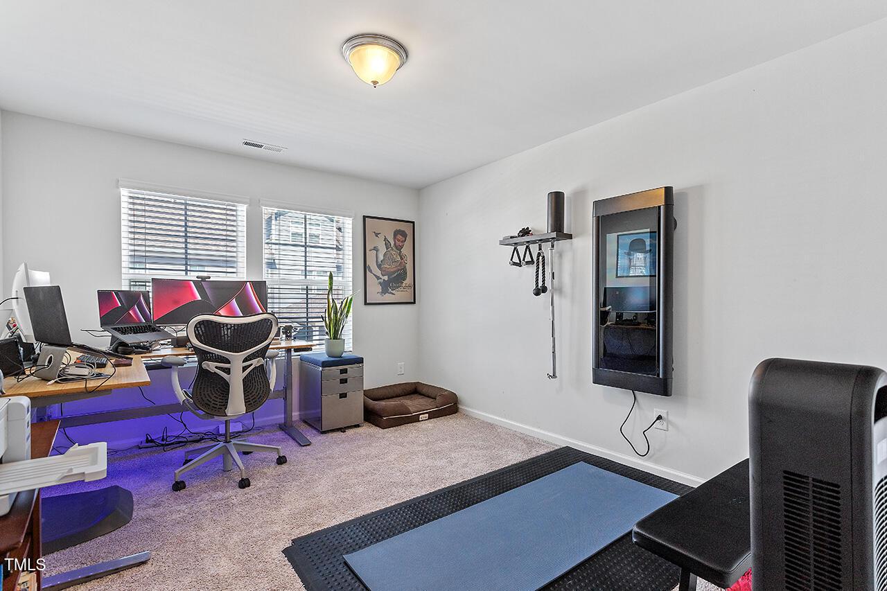 1420 Southpoint Trail Durham, NC 27713 - Photo 19 of 33 a living room with furniture and a window