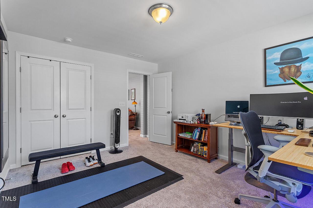 1420 Southpoint Trail Durham, NC 27713 - Photo 20 of 33 a view of a workspace with furniture and toys