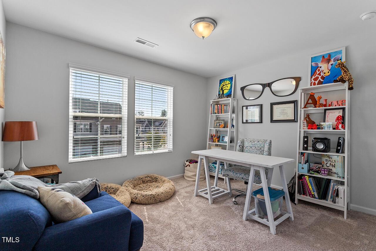 1420 Southpoint Trail Durham, NC 27713 - Photo 21 of 33 a livingroom with furniture and a window