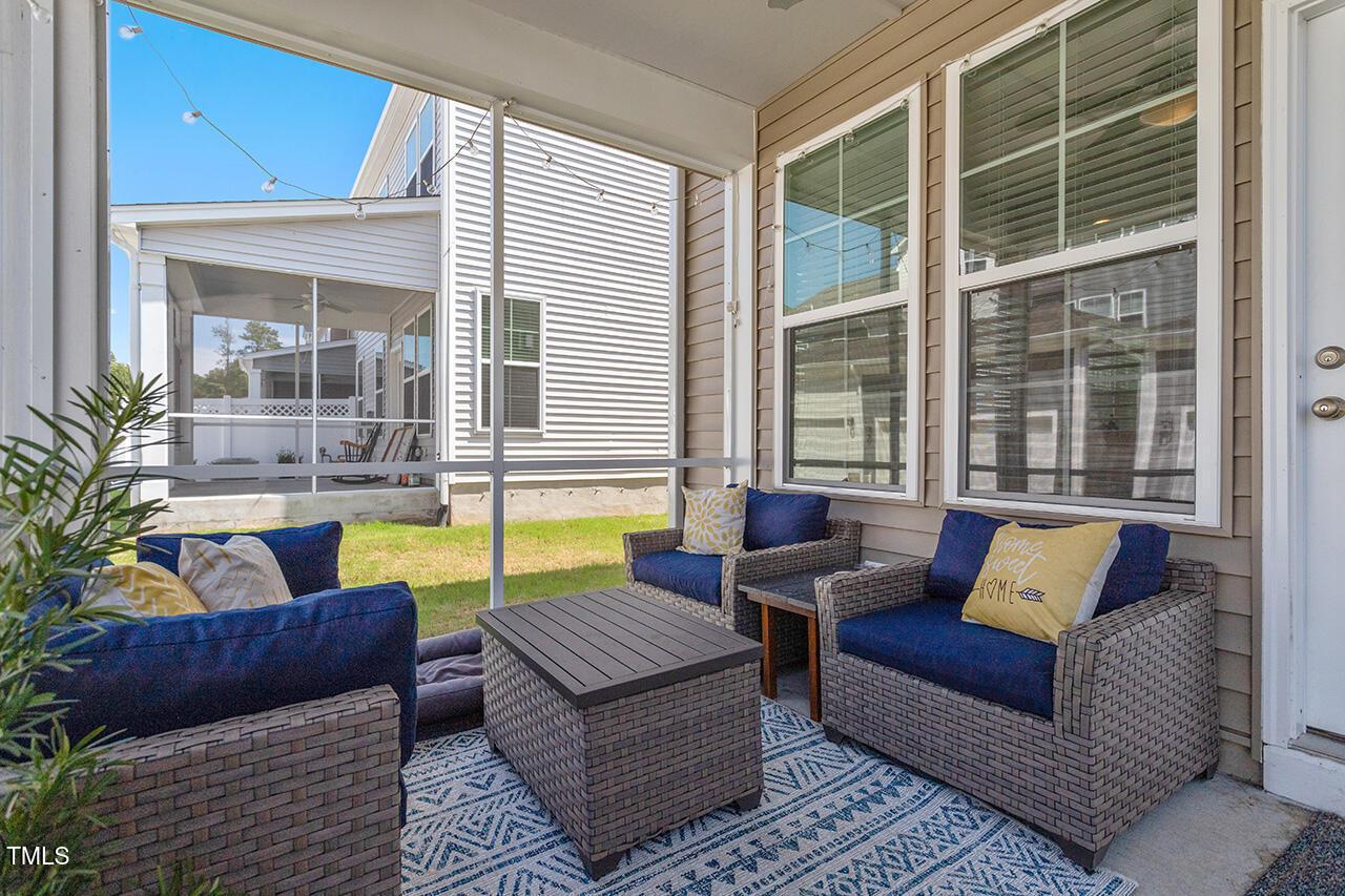 1420 Southpoint Trail Durham, NC 27713 - Photo 30 of 33 a living room with furniture and a large window