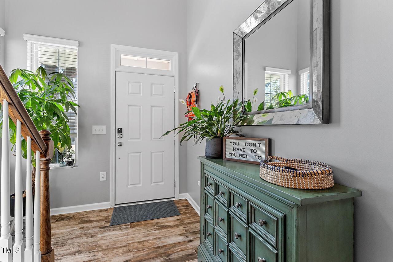 1420 Southpoint Trail Durham, NC 27713 - Photo 5 of 33 a dining room with table and chairs