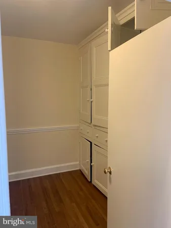 a view of storage and utility room with empty racks