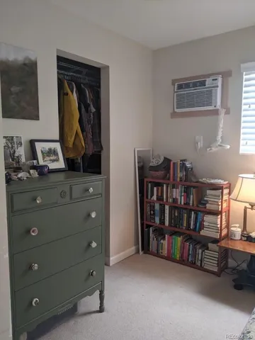 a view of a room that has a large window