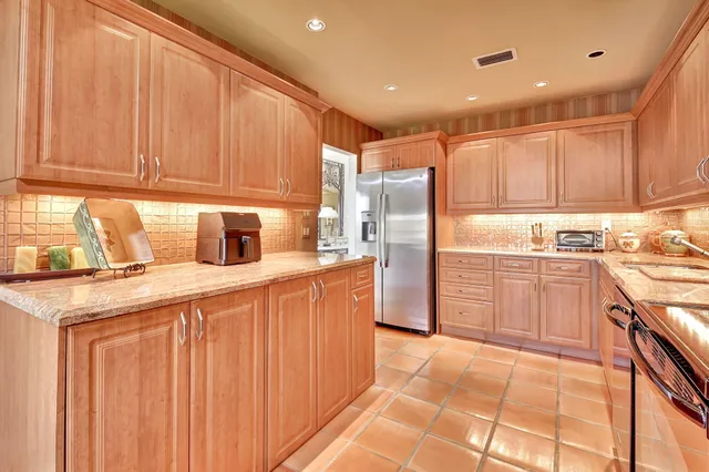 a bathroom with a bathtub and a toilet