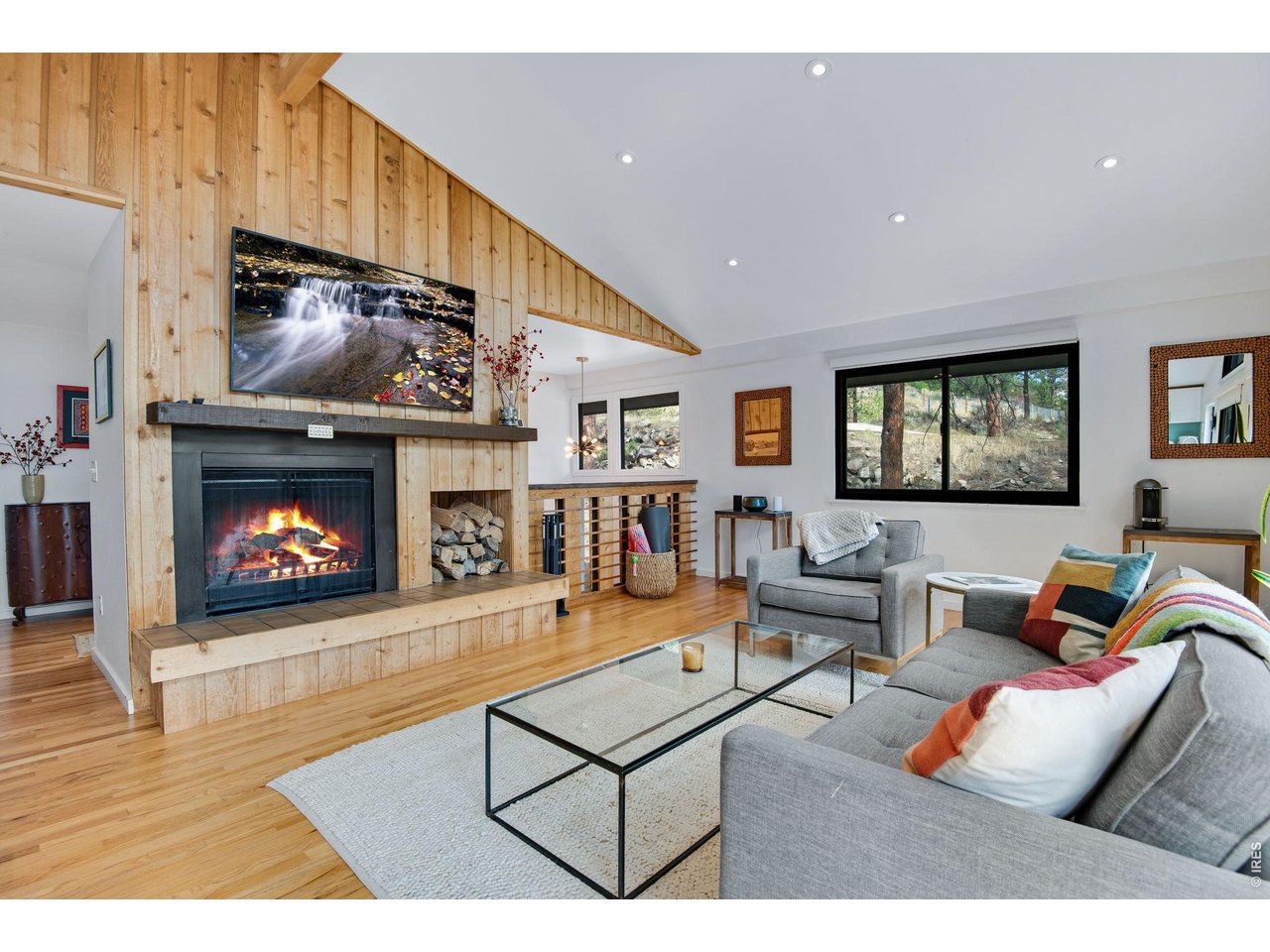 8394 Larkspur Road Boulder, CO 80302 - Photo 22 of 34 Two working fireplaces in the Treehouse