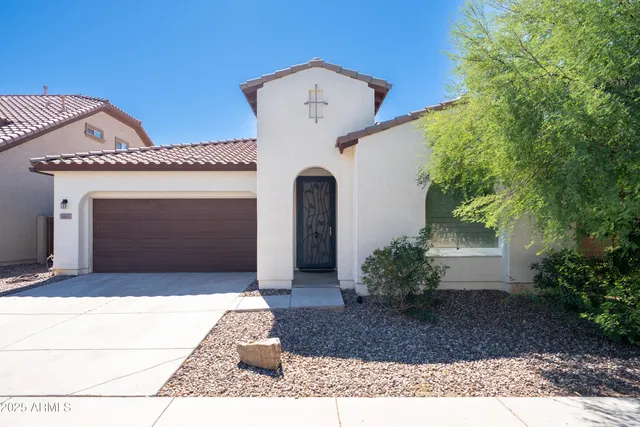 an aerial view of a house with a lake view