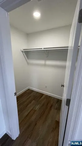 a view of an empty walk in closet