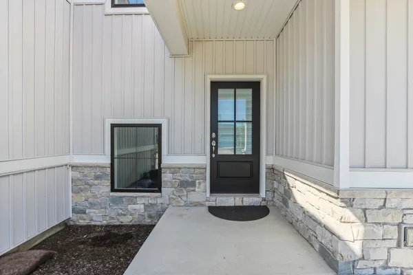 a view of an entryway with a fireplace