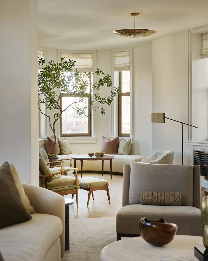 175 5th Avenue, Unit 6NORTH Manhattan, NY 10010 - Photo 4 of 16 a living room with furniture and a large window
