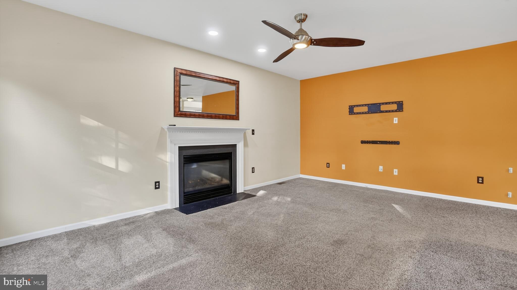 2801 Klein Court Crofton, MD 21114 - Photo 11 of 46 a view of an empty room with a fireplace